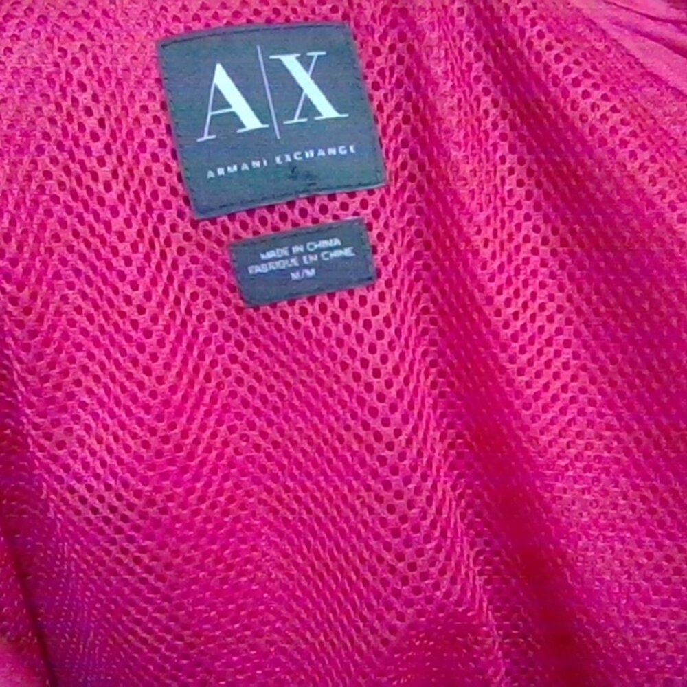 AX women pink rain jacket with hoodie.